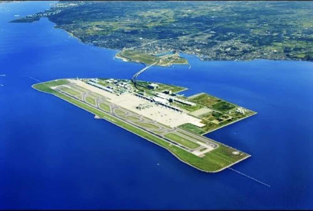 The Kansai International Airport from above, with a focus on the air strip